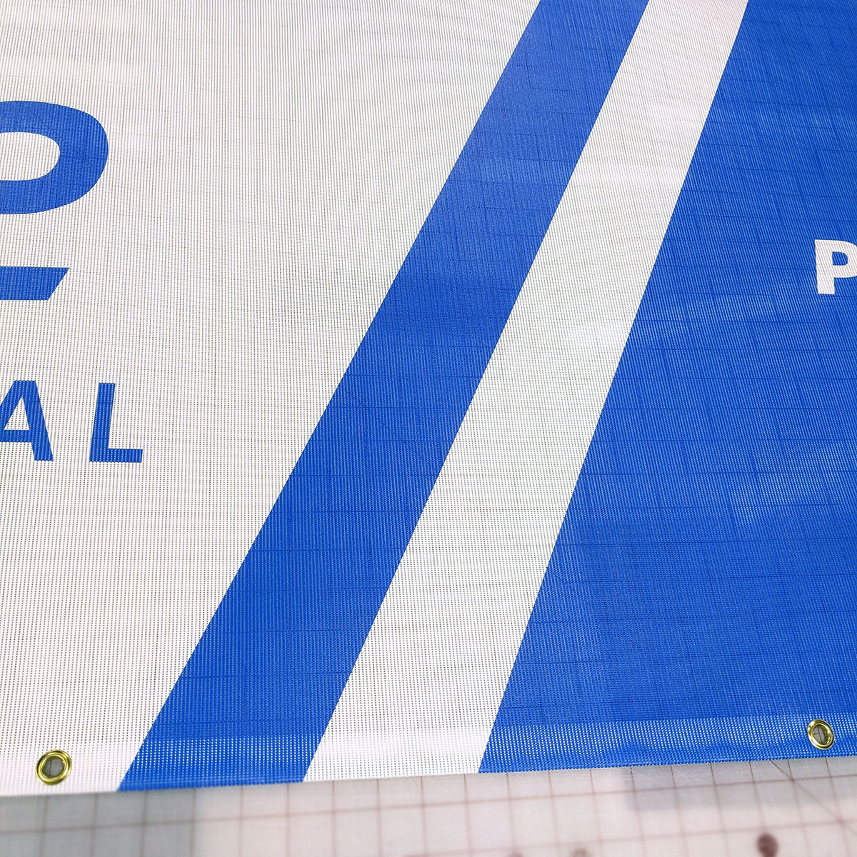 mesh banner, fence banner, mesh banner Winnipeg, wind resistant banner, fence banner Winnipeg, mesh banner Manitoba, construction banner, construction fence banner Winnipeg, construction fence banner Manitoba