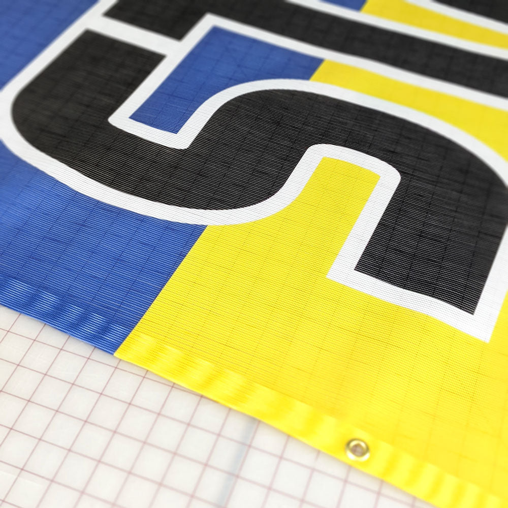 mesh banner, fence banner, mesh banner Winnipeg, wind resistant banner, fence banner Winnipeg, mesh banner Manitoba, construction banner, construction fence banner Winnipeg, construction fence banner Manitoba