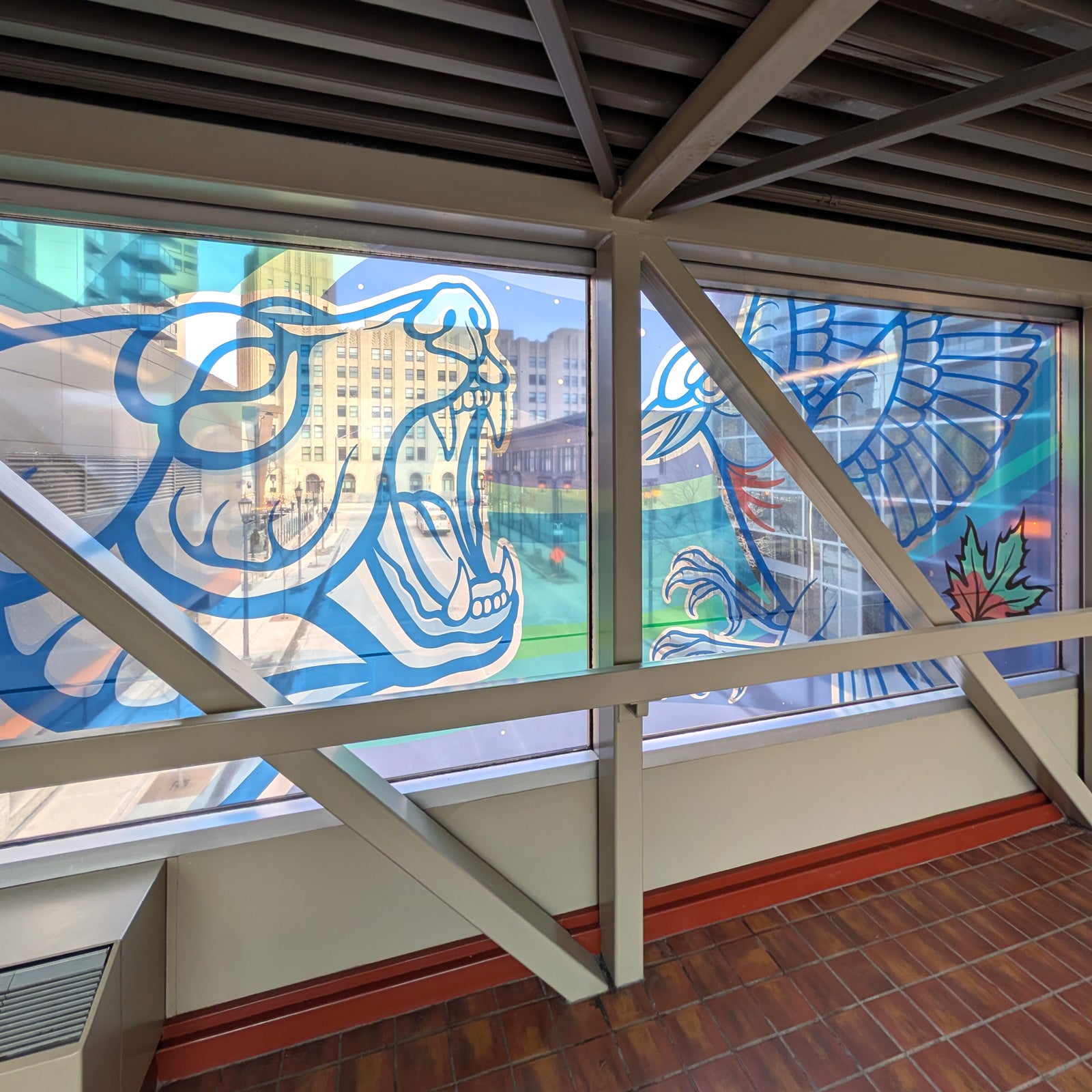 Stained glass window with abstract designs in a modern building interior.
custom door decals, entrance door decal, door decals Winnipeg, custom window decals graphics stickers, perforated window decals graphics stickers, removable window decals graphics, permanent window decals graphics stickers, frosted window decals graphics, vinyl lettering, window decals graphics stickers Winnipeg, window decals graphics stickers Manitoba, window decals graphics stickers fast