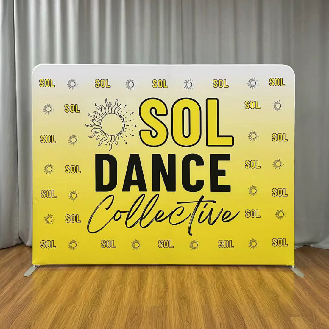 Yellow backdrop with 'SOL Dance Collective' text and logo on a wooden floor.
fabric backdrop media banner, fabric backdrop media banner Winnipeg, fabric backdrop media banner Manitoba, fabric backdrop media banner for event, fabric backdrop media banner for tradeshow, fabric backdrop media banner for reception, fabric backdrop media banner for event Winnipeg, media Wall Winnipeg